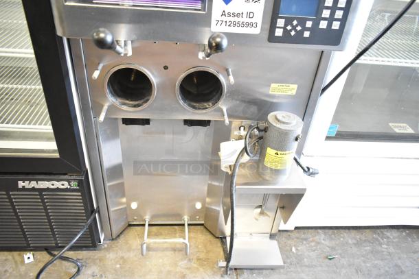 Stoelting stainless steel commercial countertop soft serve ice cream machine with drink mixing attachment, asset ID 7712955993.