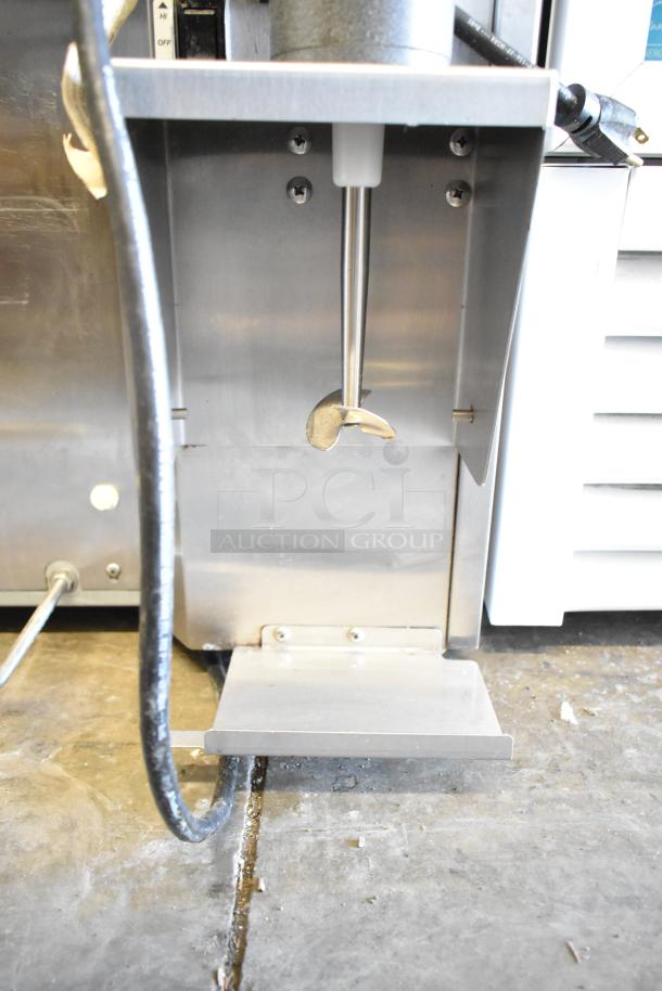 Stoelting stainless steel commercial countertop soft serve ice cream machine with drink mixing attachment, used condition.