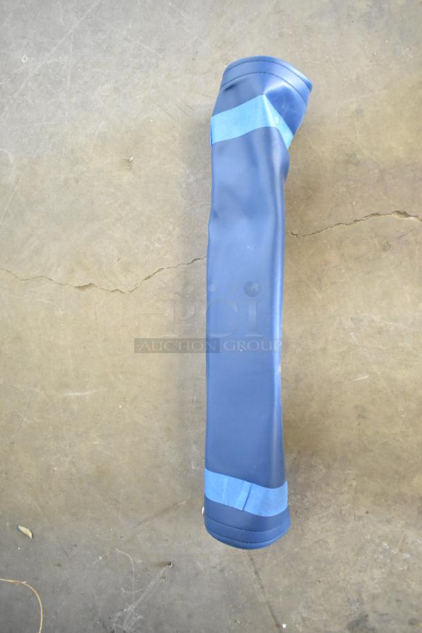 Roll of blue material, wrapped, good condition. Auction includes four rolls.