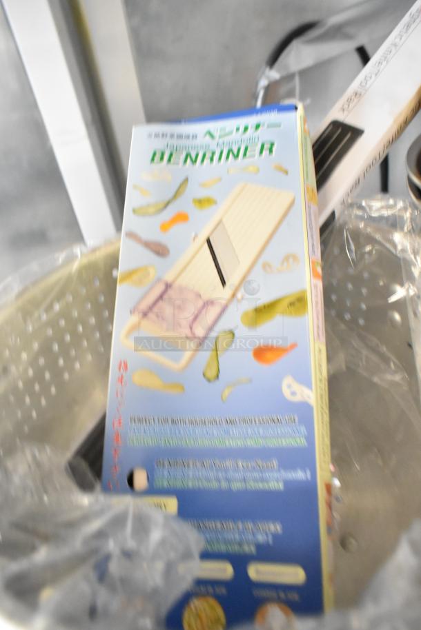 Brand new assortment of kitchen items, including an 18" magnetic knife rack, Winco colander, butter roller, and Vollrath skillet.