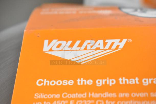 Orange Vollrath packaging with white logo. Silicone handle info on box, part of 14 new scratch and dent kitchen items.