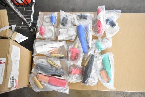 16 brand new Marinco electrical components, including connectors and protective caps, in packaging. Scratch and dent sale.