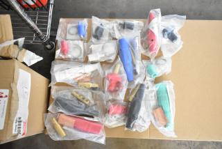 16 brand new Marinco electrical components, including connectors and protective caps, in packaging. Scratch and dent sale.