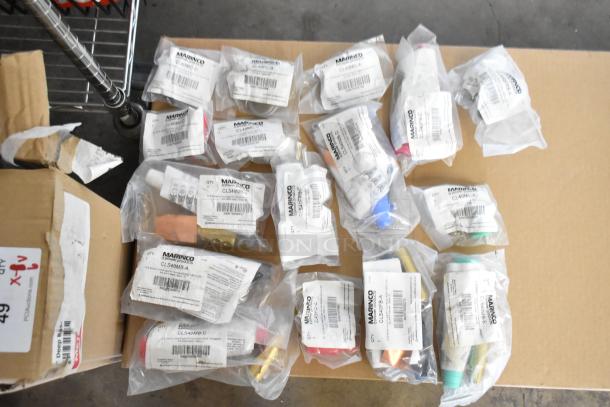 16 brand new Marinco electrical caps and connectors in factory packaging, including models CL40MC-D and CLS40MB-A.