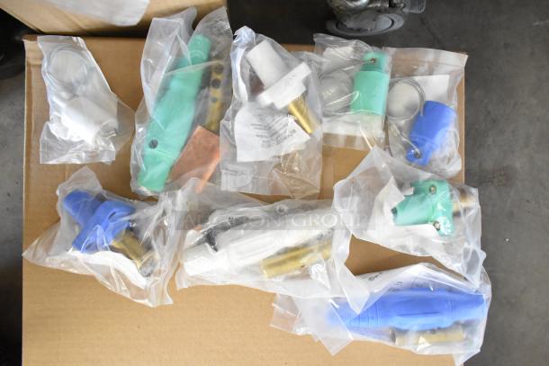 Nine brand new Marinco electrical items sealed in plastic, including protective caps, panel mounts, and single pin connectors.