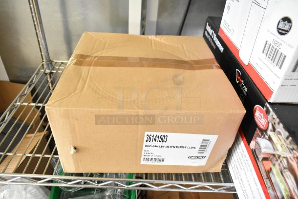 Cardboard box on shelf with Carlisle label, item 36141503 Duo-Pan Lobby Dustpan with Broom and Clip.