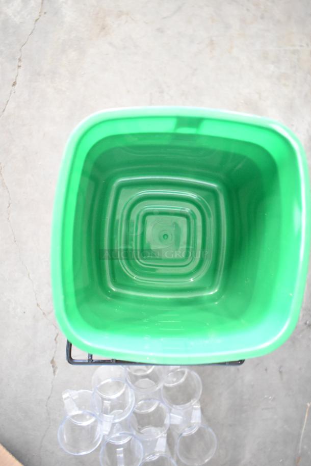 Green poly bin, part of 18 scratch and dent items including brushes and bins. Brand new, ideal for storage solutions.