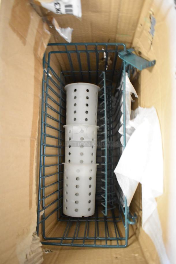 Box of new scratch and dent items including green finish baskets and poly silverware bins, offering six times the bid value.