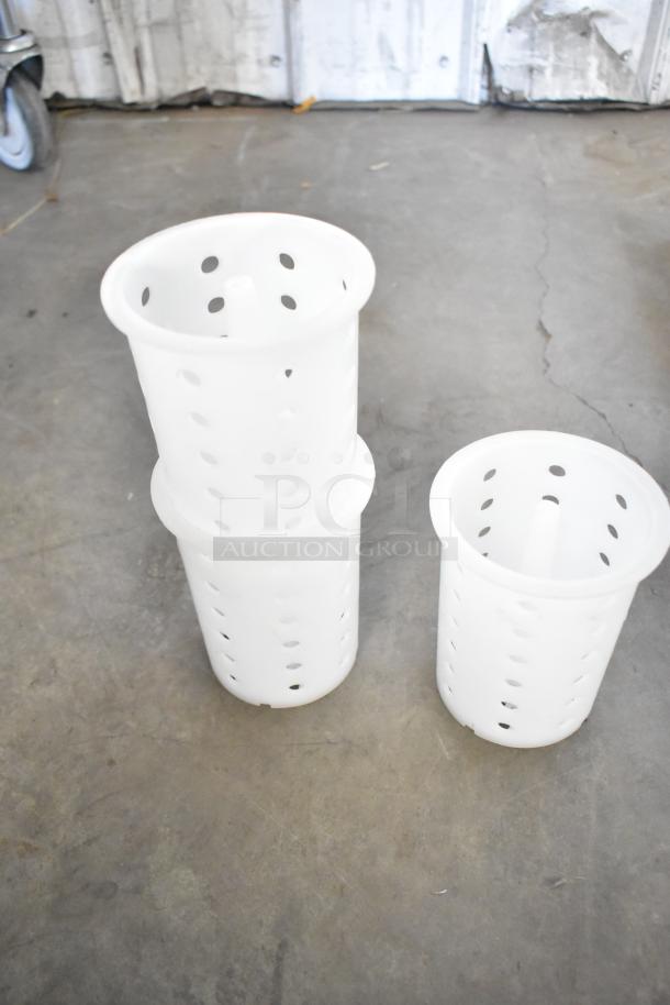 6 brand new poly silverware bins. White with ventilated design. Additional items include green finish baskets.