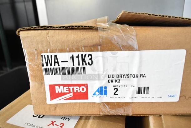 Boxes labeled Metro IWA-11K3 and GS1836K3. Includes Metroseal 3 lid holder and grid shelf. New condition.