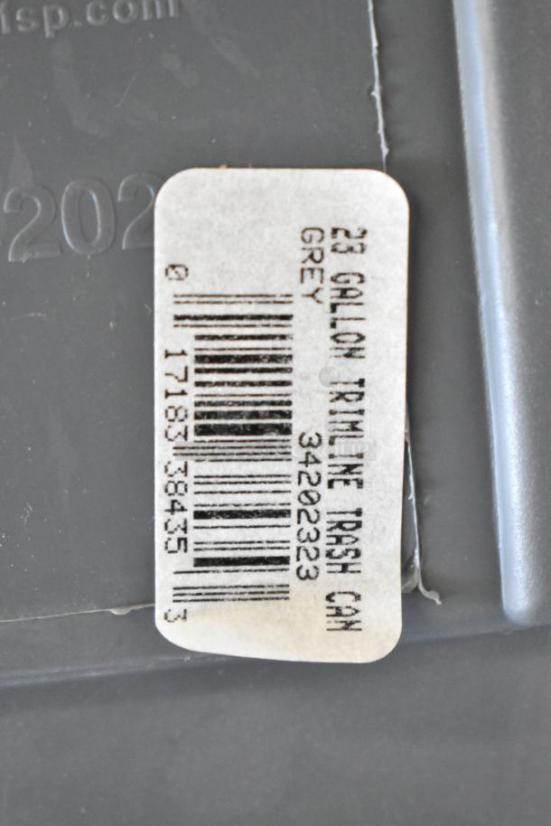 2 gray Poly Slim Jim trash cans, 23-gallon each, trimline design, with tags showing barcode and model number 34202323.
