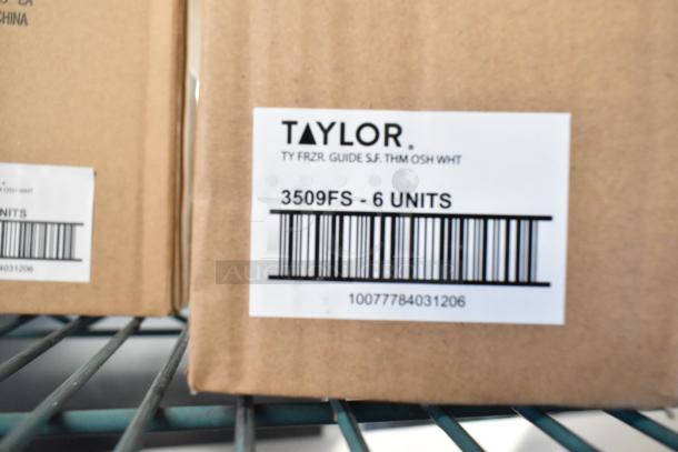 Box with a label indicating Taylor 3509FS Thermometer, 6 units per package, part of a 12-item scratch and dent auction set.