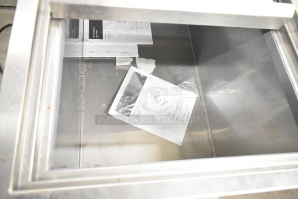 2021 H&K 52473-1 Commercial French Fry Freezer interior, stainless steel, with instructional manuals, on commercial casters.