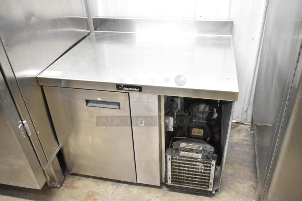 Delfield 18WC39R single door work top cooler, stainless steel, 115V, 1 phase, includes back splash, visible Delfield logo.
