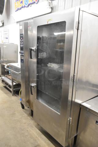 Alto Shaam stainless steel commercial combi convection oven with probe. Features control panel, dual handles. Excellent condition.