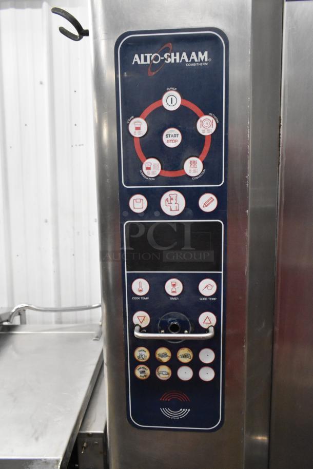 Alto Shaam stainless steel commercial combi convection oven with control panel, featuring start/stop button and mode selections.
