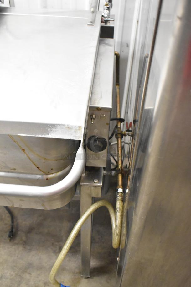 Groen N/HFP commercial natural gas braising pan, 106,000 BTU, floor style, visible pipes, sturdy stainless steel, used.