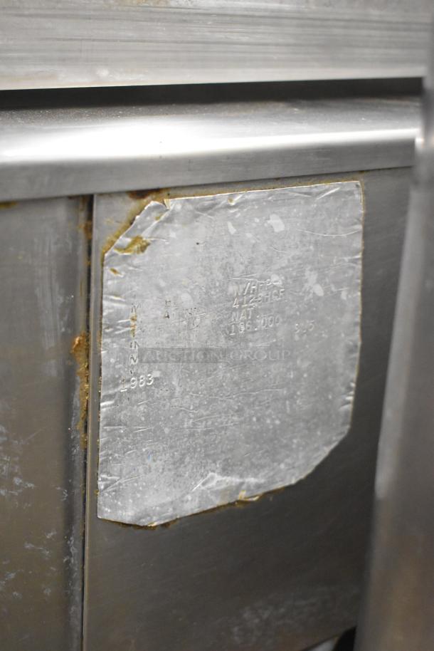 Groen N/HFP commercial braising pan, natural gas, 106,000 BTU, metal label with model details visible, worn condition.