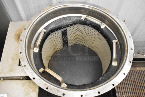 Salvajor S419 Commercial Trough Collector, shown with visible stainless steel handles and perforated inner lining, in used condition.