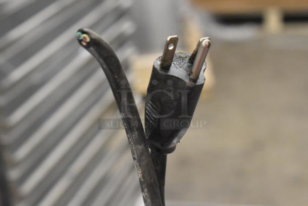 Electro Freeze 56TF-232 soft serve machine plug detail; 208-230V, 3-phase, commercial casters, 2 flavors with twist.