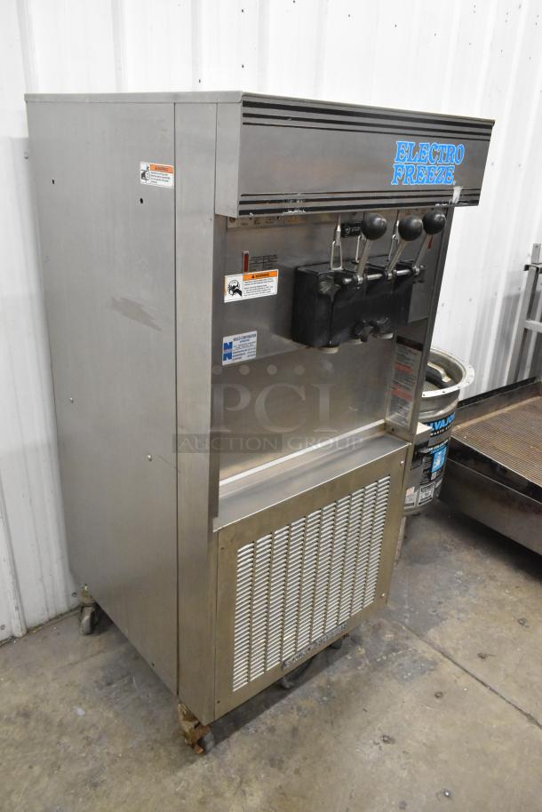Electro Freeze 56TF-232 soft serve machine, 2 flavors with twist, commercial casters, 208-230V, 3-phase, stainless steel.