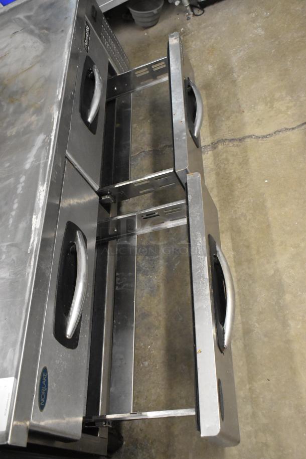 Norlake Commercial Chef Base, 4-drawer, stainless steel, on casters. Features easy-grip handles, 115V, 1 phase. Visible Norlake label.