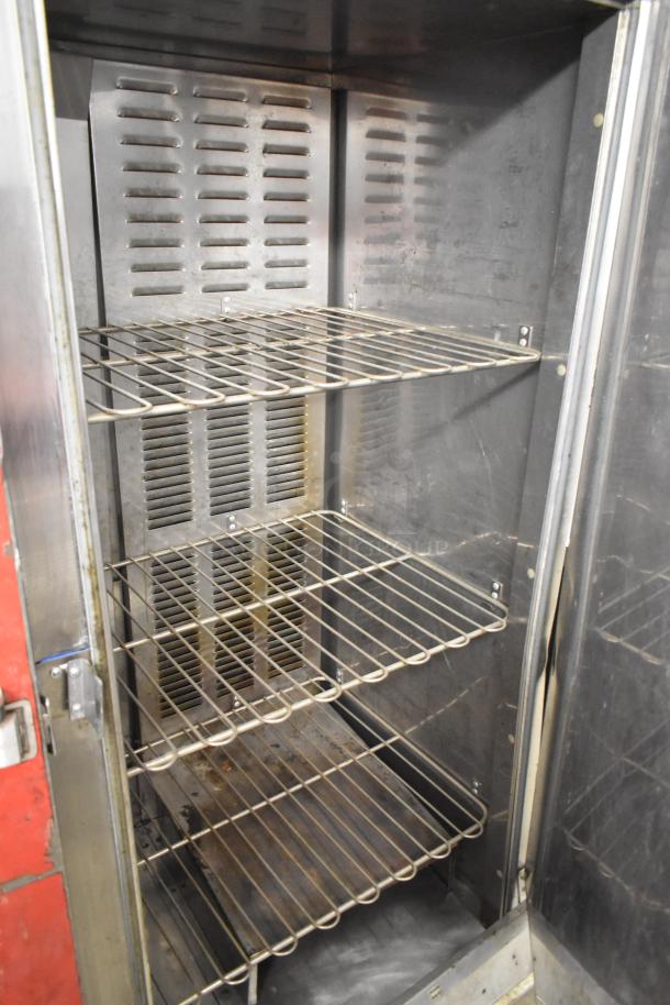 Carter Hoffmann BB1000 heated holding cabinet with metal racks, commercial casters. 120V, 1 phase, used condition.