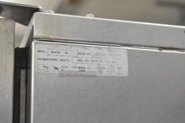 Carter Hoffmann BB1000 metal heated holding cabinet label, 120V, model details visible, on commercial casters.