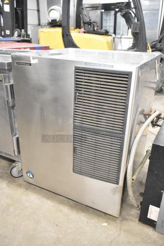 Hoshizaki KM-900MAH commercial ice head in silver, showing air filter and branding. 208-230 volts, 1 phase, used condition.