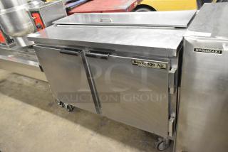 Beverage Air SUR48-12 commercial prep table on casters, stainless steel, dual doors, 115V, 1 phase, clean condition.