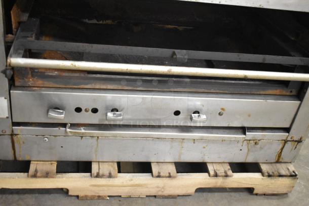 C-45 Commercial Natural Gas Powered Cheese Melter, 42,000 BTU, stainless steel, visible wear and rust, on wood pallet.