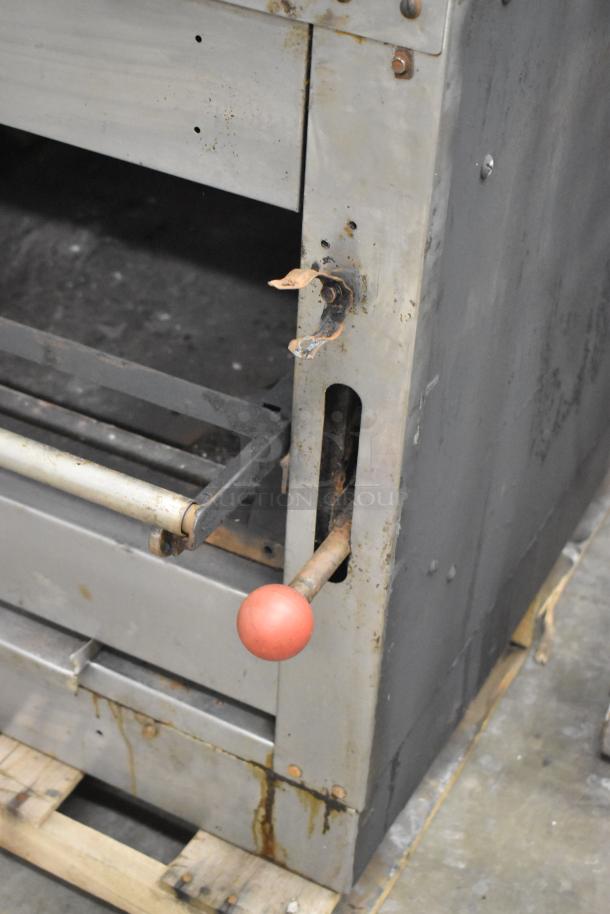 C-45 Commercial Natural Gas Cheese Melter, 42,000 BTU, model C-45, showing wear and some rust on exterior.