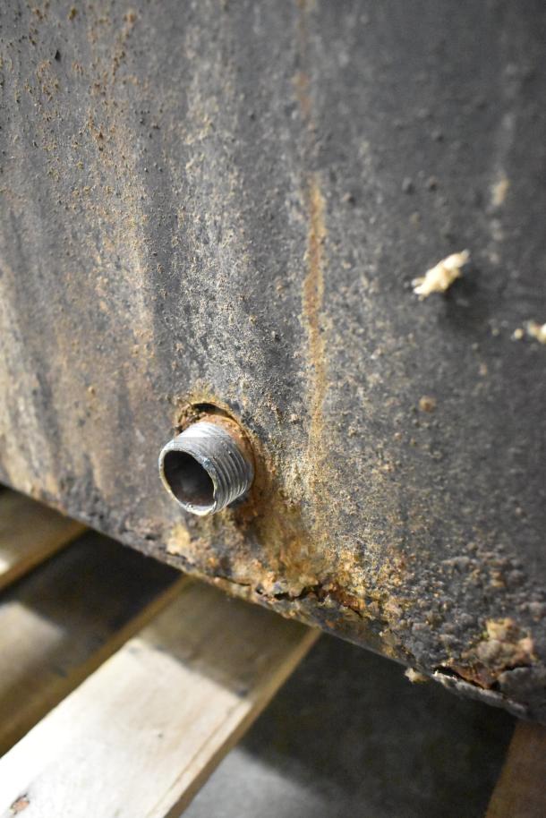C-45 Commercial Natural Gas Cheese Melter, 42,000 BTU. Rusted exterior with visible wear and gas connection fitting.