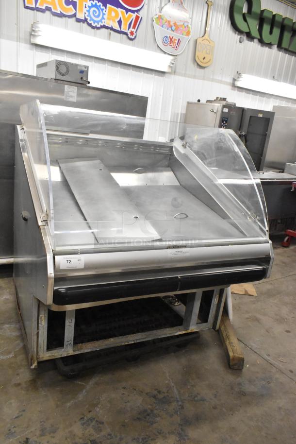 Hussmann DSF-4-REM open fish service case, stainless steel, clear panels, 120/208-240V, 1 phase, commercial use, fair condition.
