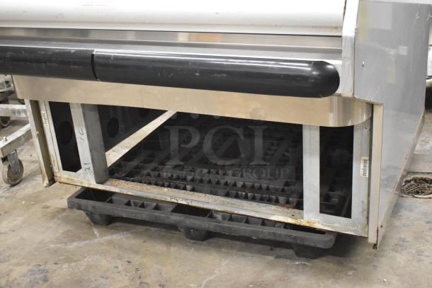 Hussmann DSF-4-REM open grab n go fish service case, stainless steel, floor style, 120/208-240V, visible wear.