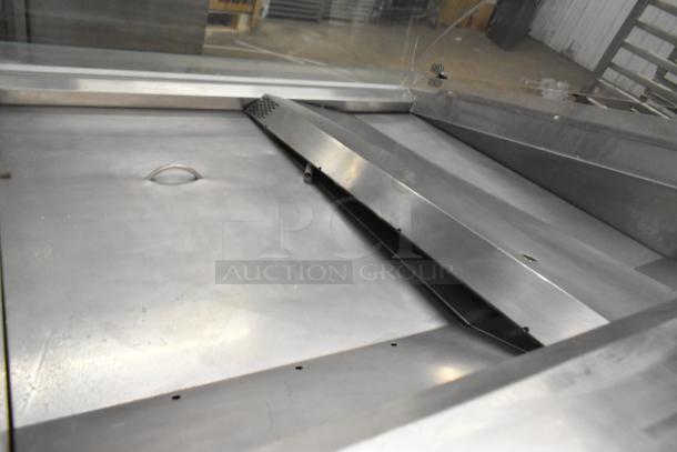 Hussmann DSF-4-REM commercial fish service case, floor style, open grab-n-go, stainless steel interior, 120/208-240V, 1-phase.