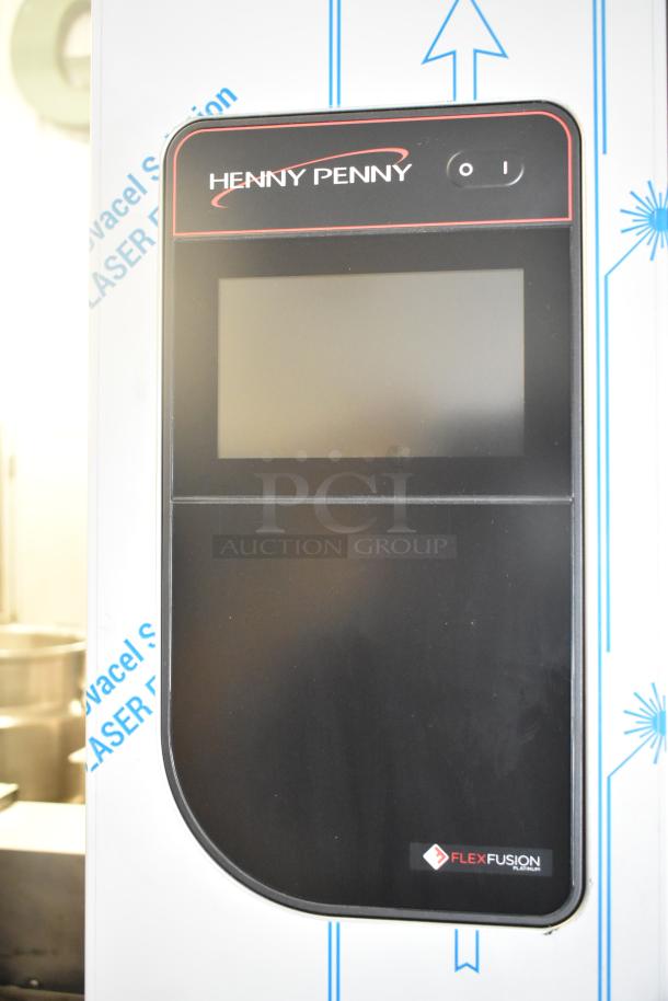 Brand new 2023 Henny Penny FPGM22172007 stainless steel commercial combi convection oven, natural gas, 200,000 BTU.