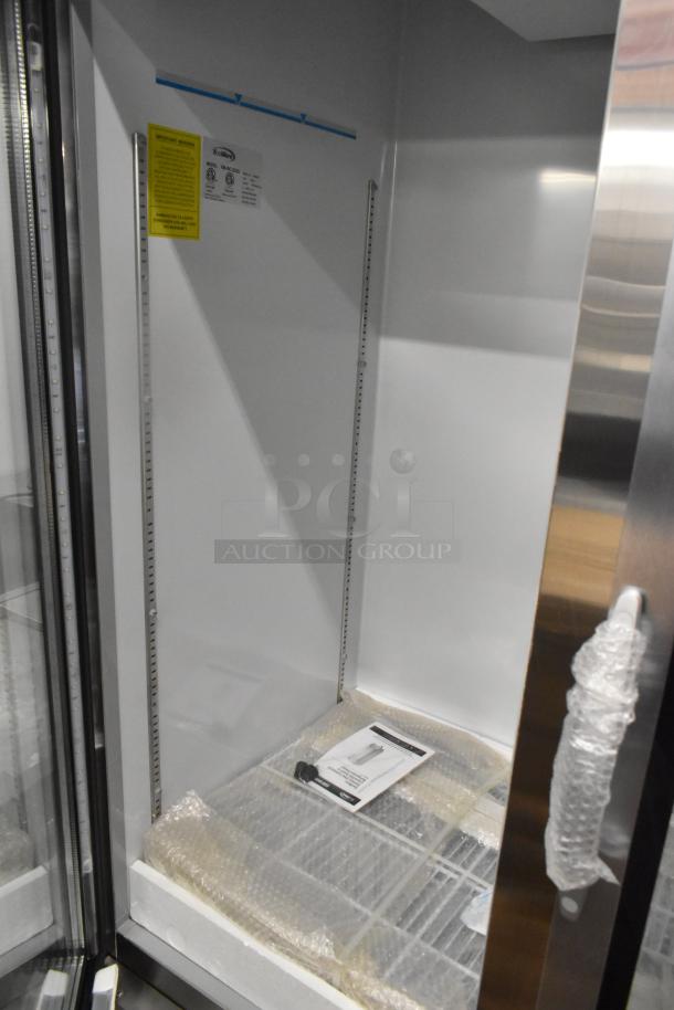 BRAND NEW KoolMore KM-RIC-2DGD commercial 2-door cooler, scratch and dent, poly coated racks, 115V, 1 phase, labels visible.