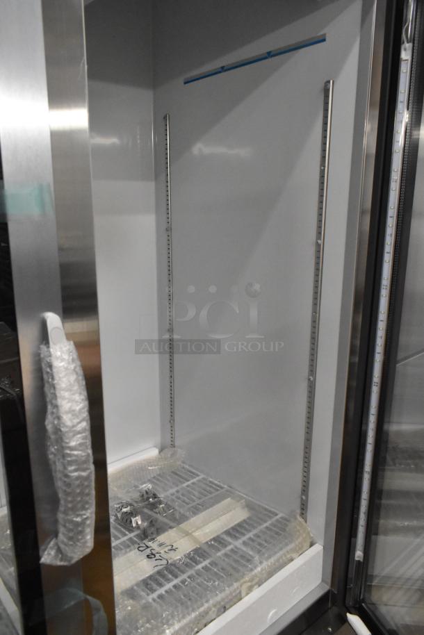 Brand new KoolMore KM-RIC-2DGD commercial reach-in cooler, 2 glass doors, poly-coated racks; slight cosmetic scratches visible.