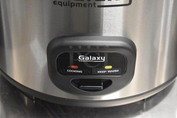 "Brand new 2022 Galaxy 177GRCS60 electric rice cooker, 60 cup capacity, cooking/keep warm indicators, 120 volts, 1 phase."