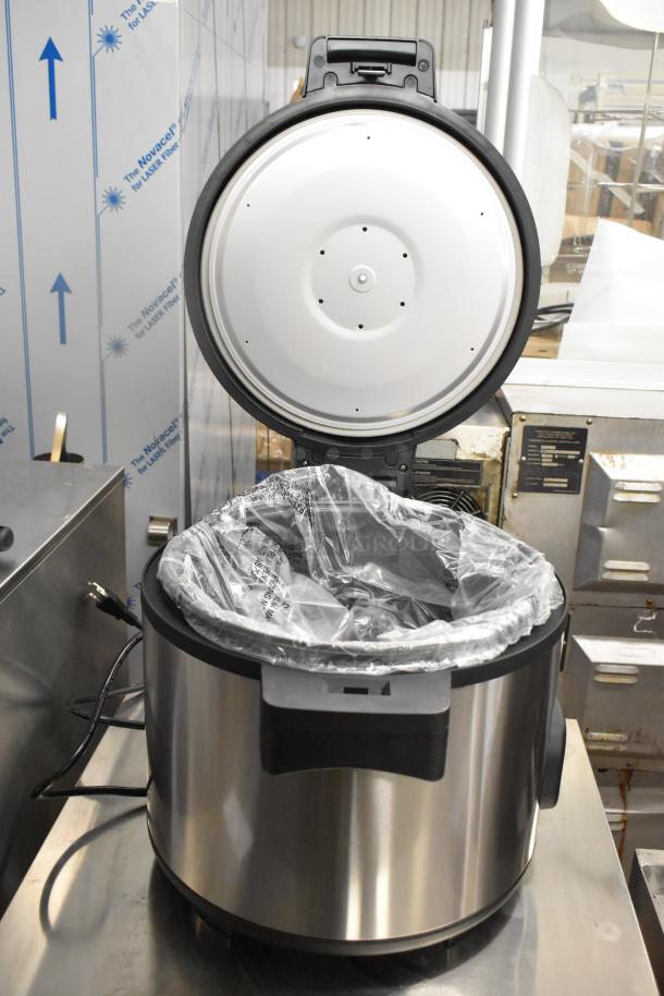 Brand new Galaxy 177GRCS60 electric rice cooker, 60 cup capacity, in stainless steel with plastic liner. 120V, 1 Phase.