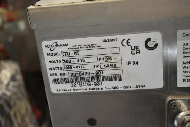 Alto Shaam CTX4-10E combi oven label showing model, voltage (380-415V), phase (3N), and serial number.