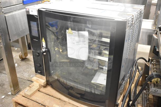 Brand new Alto Shaam AR-7T commercial electric rotisserie oven, 2022 model, 7 spits, 380-415V, 1 phase, with tags.
