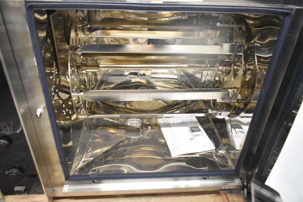Brand new 2022 Alto Shaam AR-7T commercial rotisserie oven, 7 spits, stainless steel, includes manual, 380-415V, 1 phase.