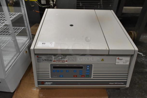 Beckman Coulter Allegra 25R Centrifuge, control panel with various buttons, maintenance tags visible, in used condition.