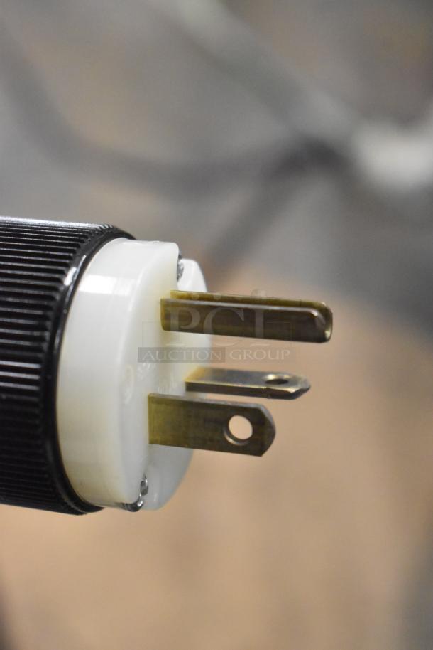 Close-up of a power plug, part of the Beckman Coulter Allegra 25R Centrifuge, showcasing prong condition.