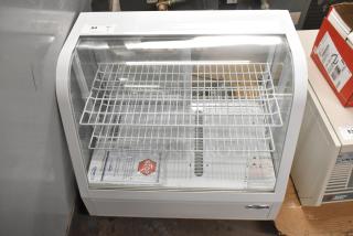 Brand new KoolMore CDC-3C-WH countertop display refrigerator, 3.6 cu ft, slight scratches, visible labels and shelving.