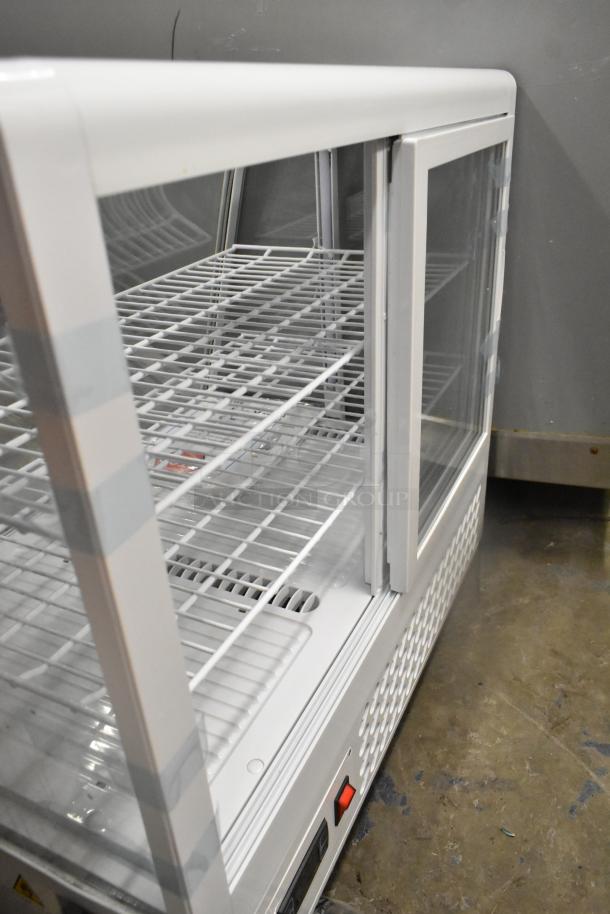 Brand new KoolMore CDC-3C-WH countertop display refrigerator, 3.6 cu ft, minor scratches, 1 phase, 110-120V.