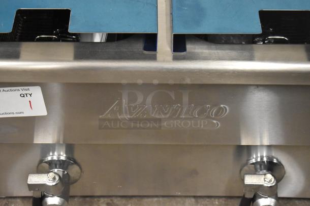 Brand new Avantco 177F202 dual-tank electric fryer with 2 metal lids and baskets, 208-240V, scratch and dent condition.