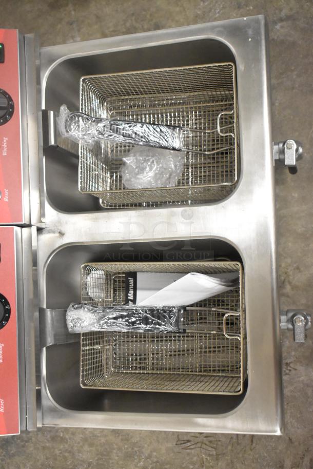 Brand new Avantco 177F202 dual tank fryer, 30 lb. capacity, includes 2 metal lids, 2 fry baskets, 208-240V, 1 phase.